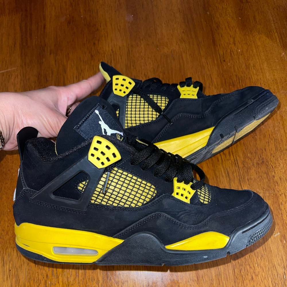 Jordan 4’a black and yellow